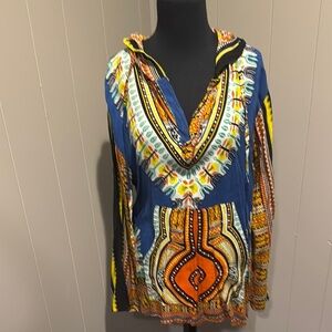 Earthbound Trading Co flowy Aztec print split neckline drawstring hoodie top.